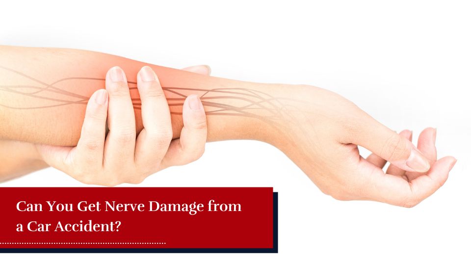person holding their arm - showing nerve damage after an auto accident